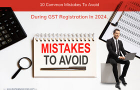 A promotional image for GST registration tips in 2024. It features a clipboard with "MISTAKES TO AVOID" written on it, a magnifying glass, and a calculator. A man in business attire is seated with a laptop. The text reads "10 Common Mistakes To Avoid During GST Registration In 2024.