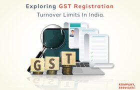 A graphic titled "Exploring GST Registration Turnover Limits in India" features a magnifying glass over GST blocks, documents, and charts on a desk. The "Kompany Services" logo is in the bottom right corner.