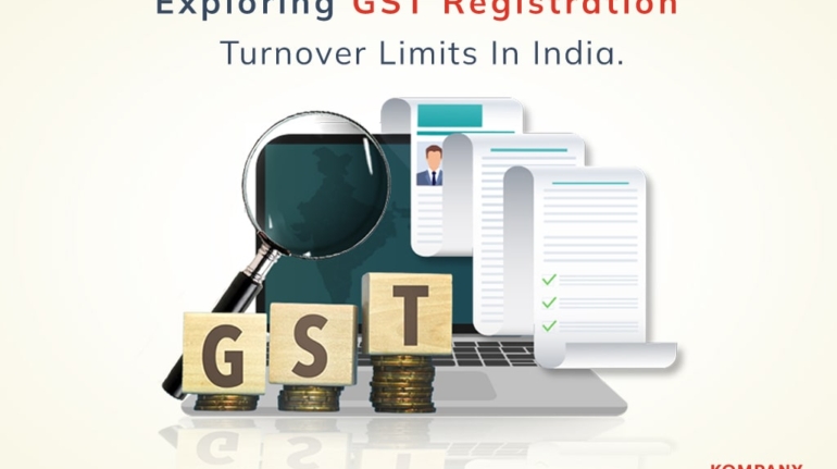 A graphic titled "Exploring GST Registration Turnover Limits in India" features a magnifying glass over GST blocks, documents, and charts on a desk. The "Kompany Services" logo is in the bottom right corner.