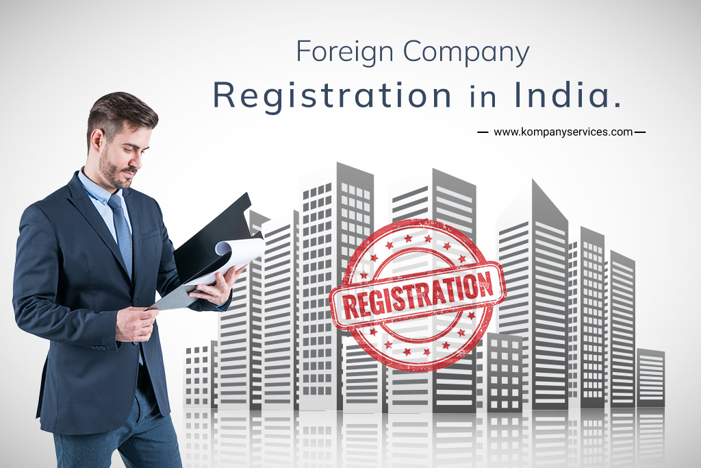 A man in a suit looks at documents while standing in front of a city skyline graphic. The text reads "Foreign Company Registration in India" with a web address below. A red stamp with the word "Registration" is overlaid on the skyline, highlighting the process for a foreign company.