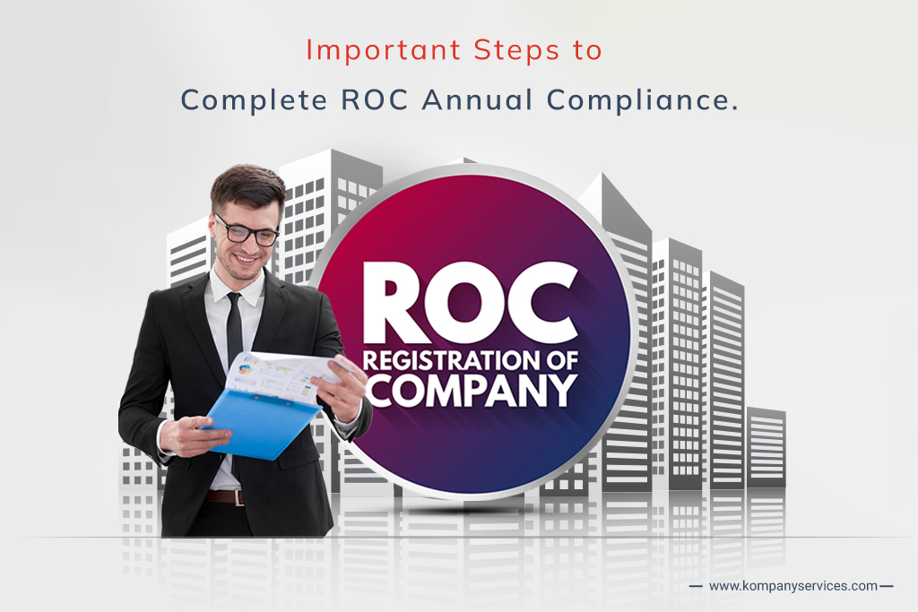 A smiling man in a suit and glasses holds a blue clipboard with documents. Behind him, a graphic with city buildings and a large circle reads: "ROC Registration of Company." The text above says, "Important Steps to Complete ROC Annual Compliance." For more information, visit www.kompanyservices.com.