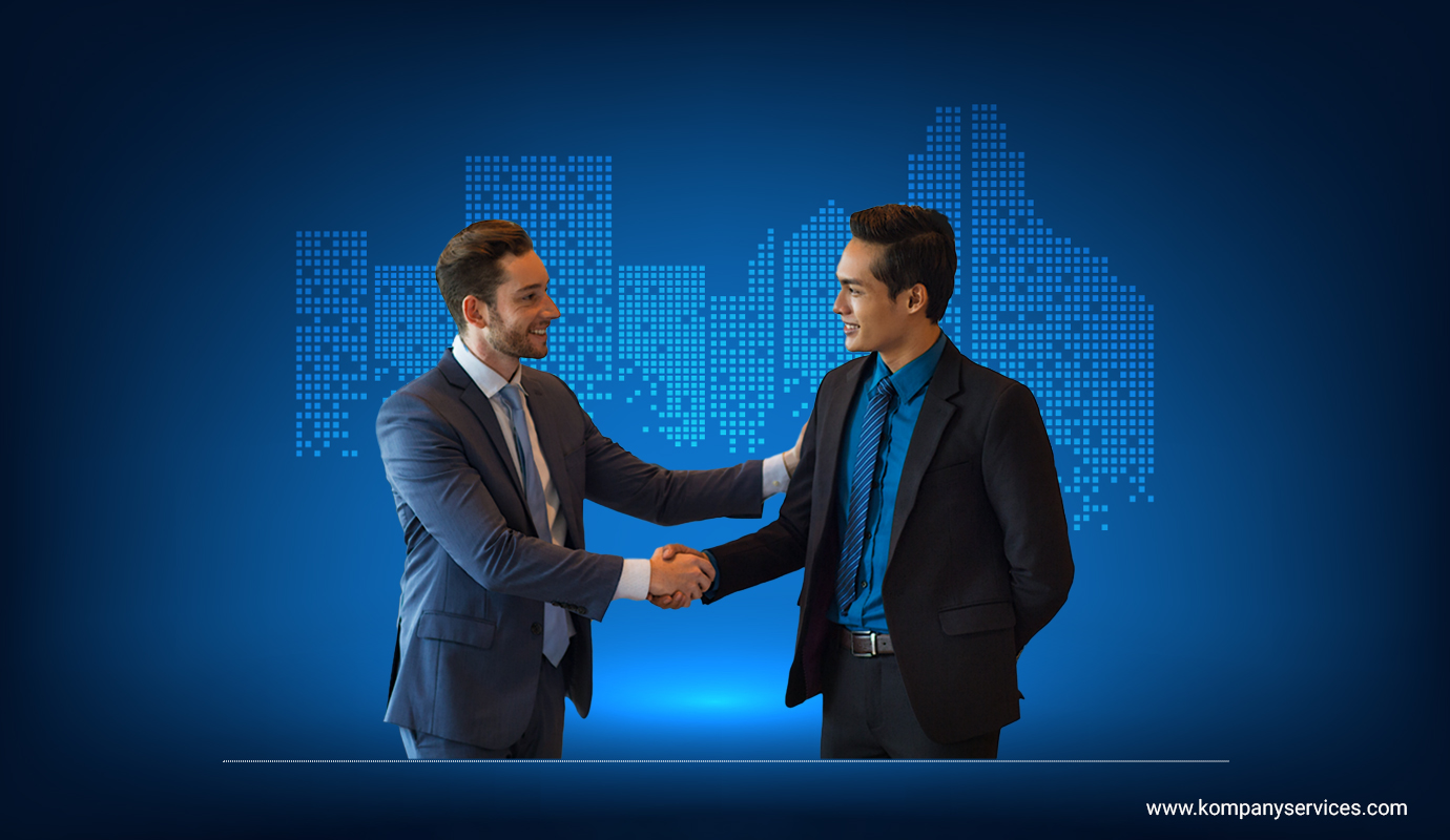 Two business professionals shaking hands and smiling against a blue background with pixelated graphics of a city skyline, highlighting their new Partnership Firm Registration. One man is in a gray suit and blue tie, the other in a black suit and blue shirt. The website "www.kompanyservices.com" is visible at the bottom.